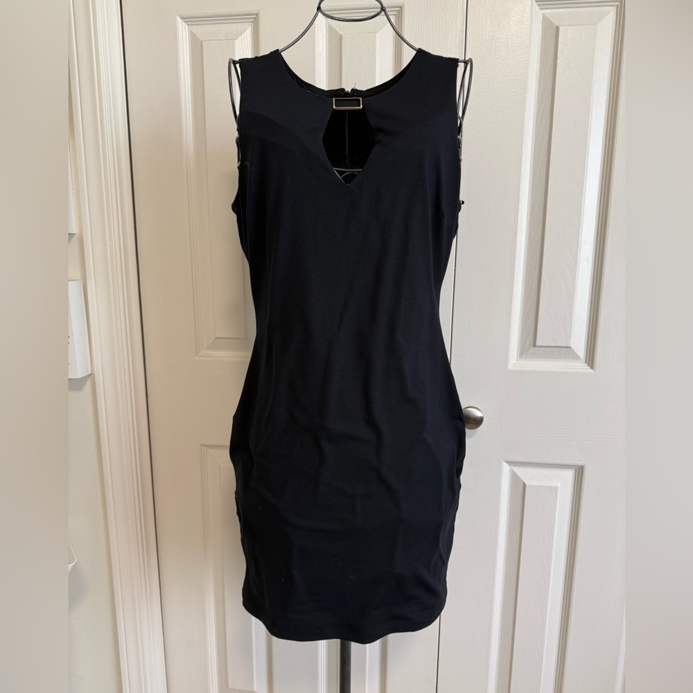 bebe Black body con Sleeveless Keyhole spandex Mini Dress.
M